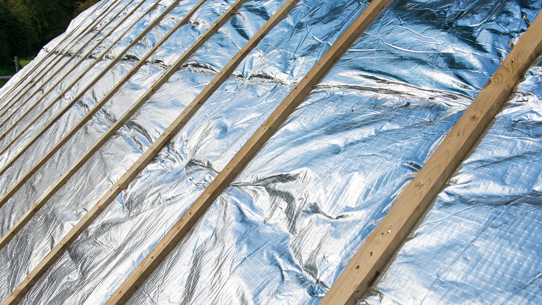Why It’s Important to Replace Insulation When Replacing Your Roof
